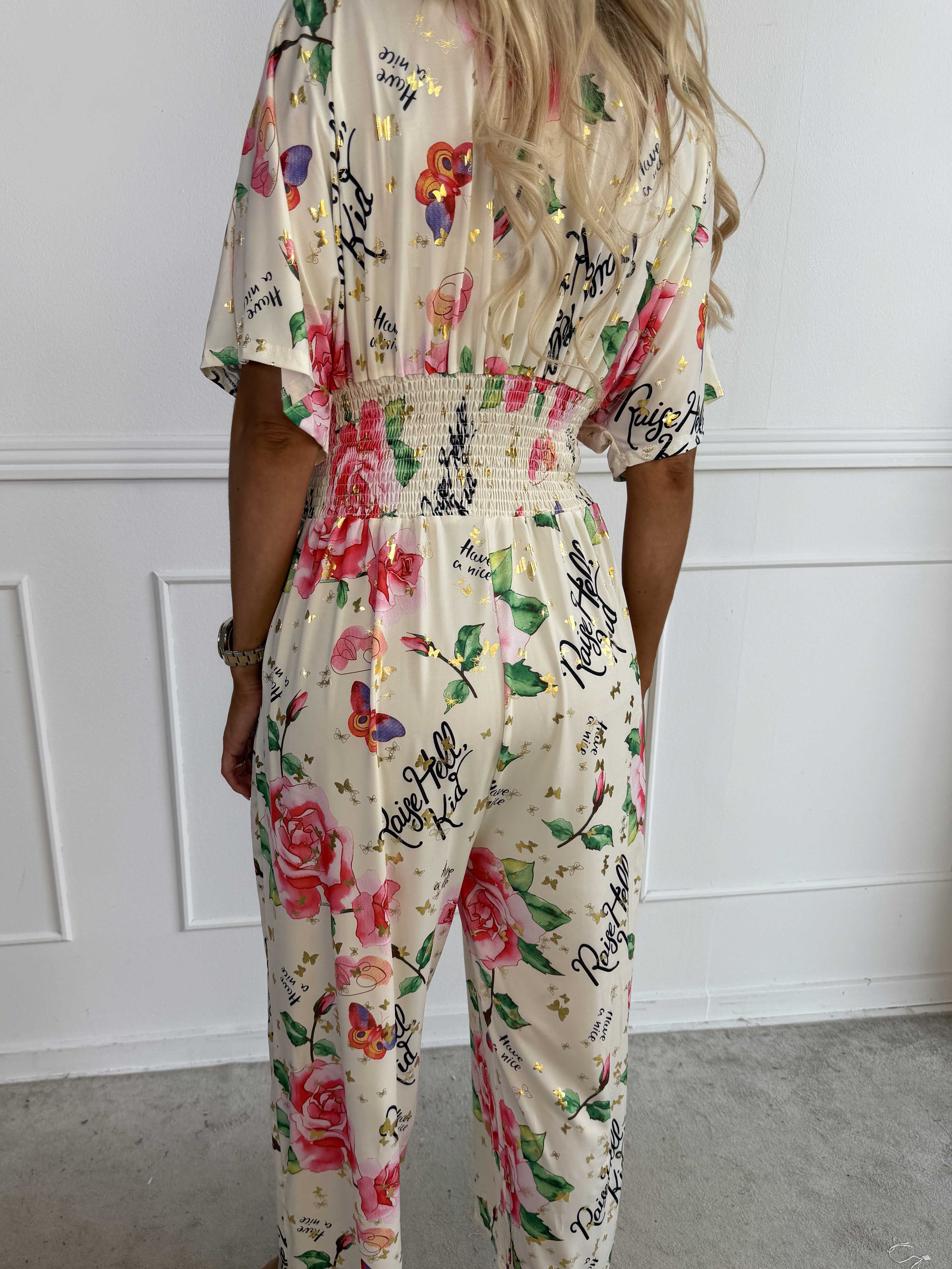 Pams Raise Jumpsuit - Elastisk buksedragt med blomsterr og guldsommerfugle